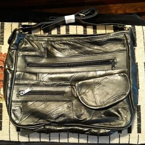 Crossbody bag with umbrella pouch